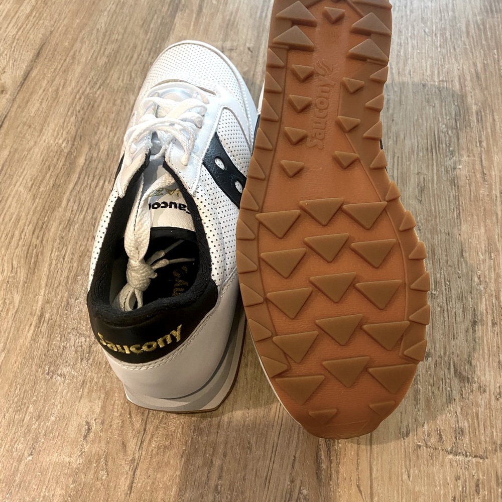 Brand new, never even been untied. White with navy accents. Perfect summer shoe